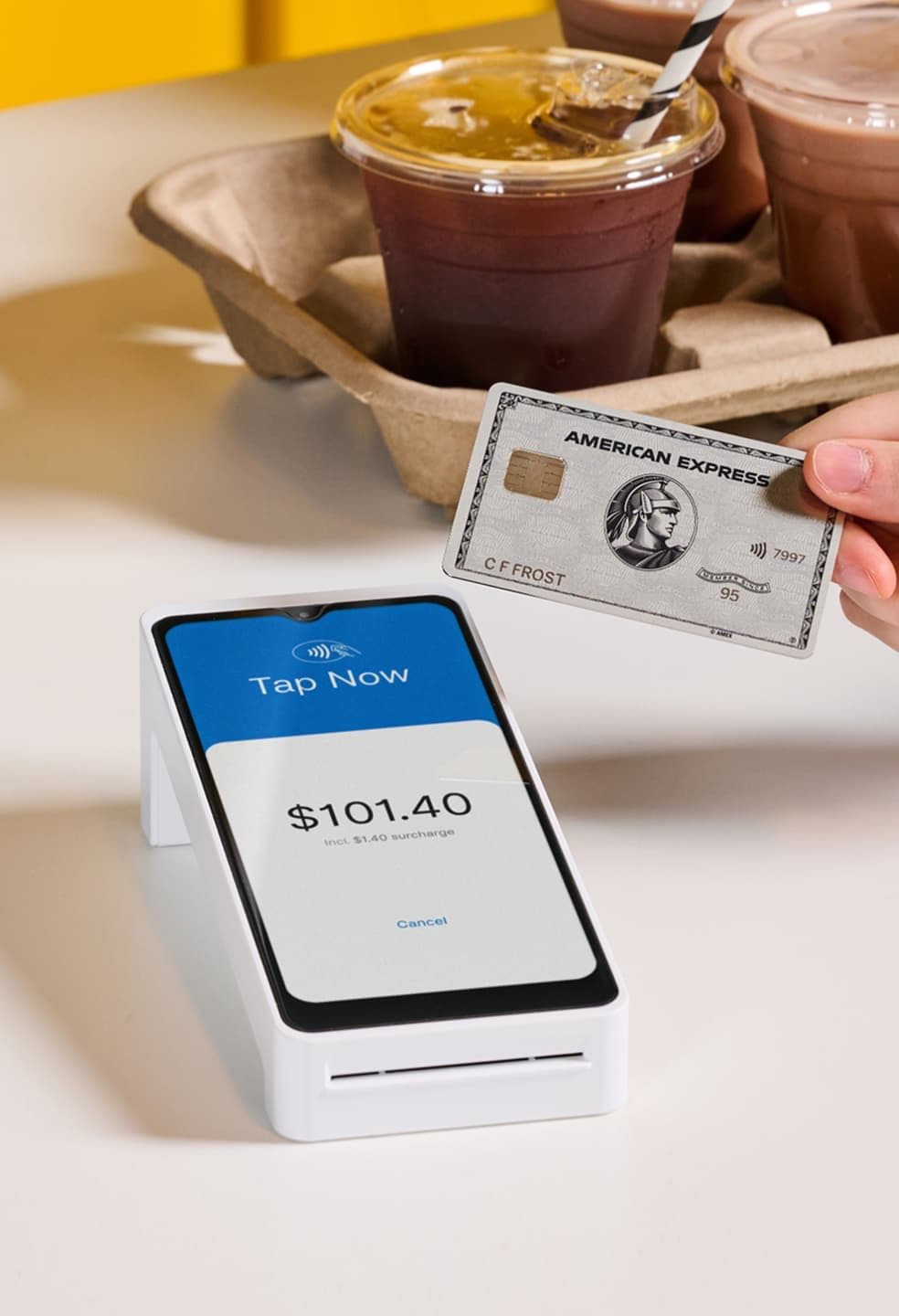 White EFTPOS Terminal in a cafe with an AMEX platinum card.