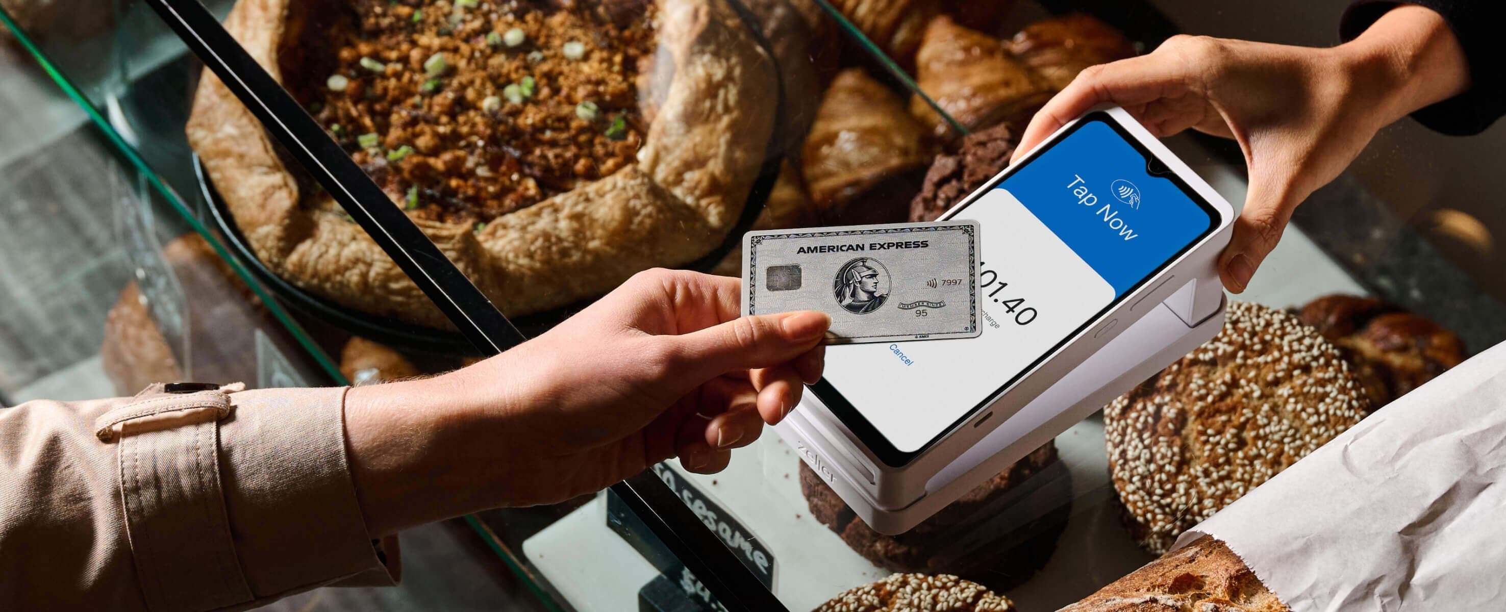 White EFTPOS machine on a bakery countertop.